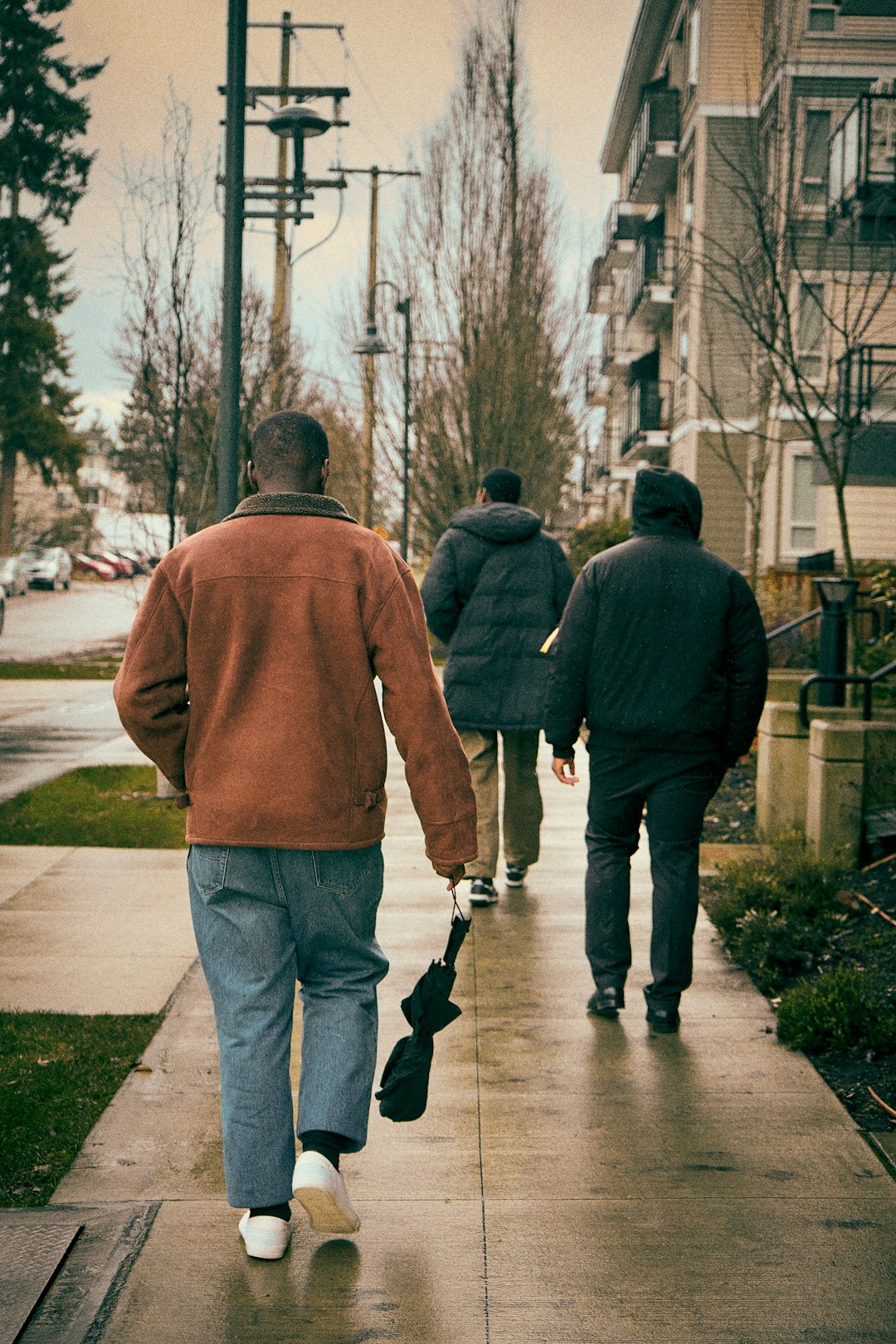 People walking in neighborhood